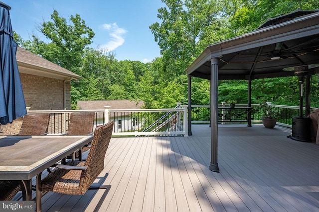 wooden deck with ceiling fan