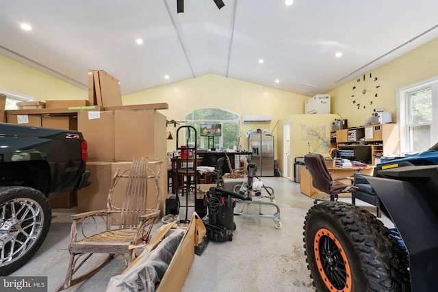 garage with stainless steel fridge