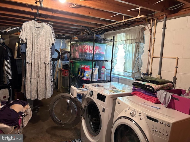 washroom featuring washer and dryer