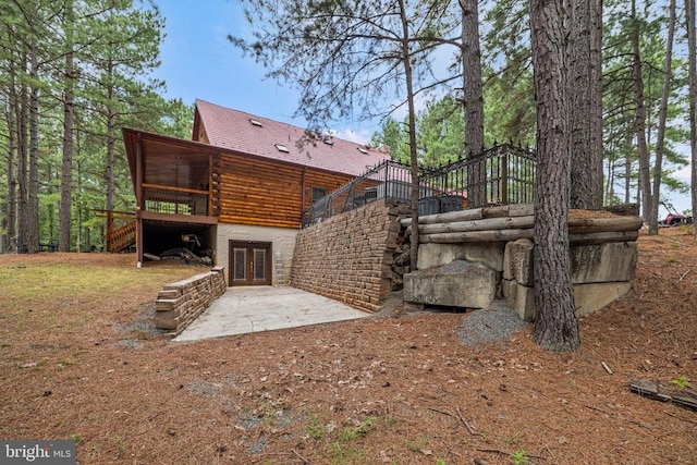 back of house featuring french doors and a patio area