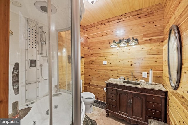 bathroom featuring tile patterned flooring, wood walls, toilet, and vanity