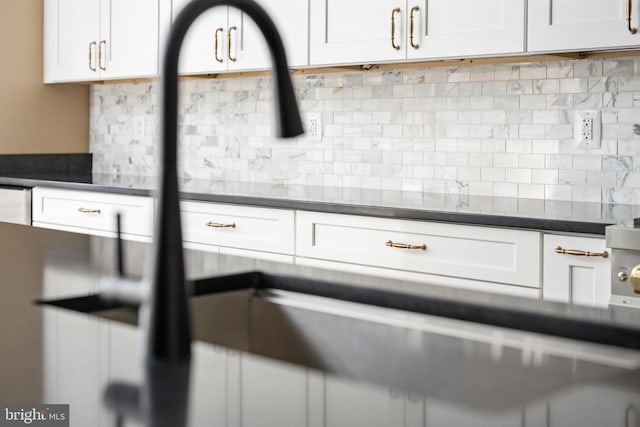 details featuring white cabinets