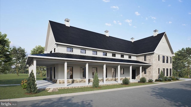 view of front of home featuring covered porch