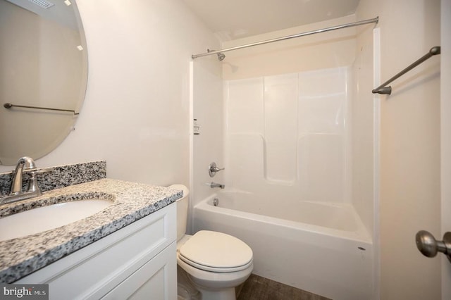 full bathroom featuring shower / tub combination, vanity, toilet, and wood finished floors