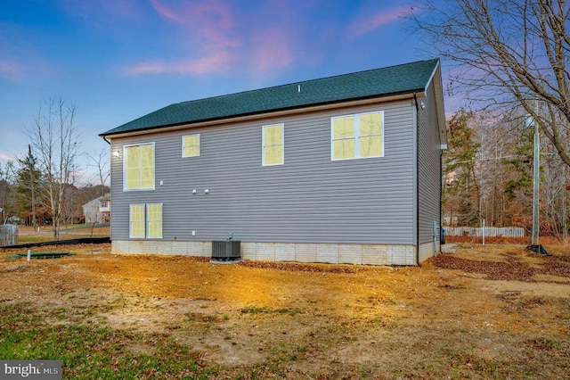 view of home's exterior featuring central AC unit