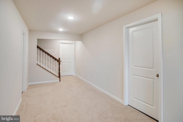 basement with light carpet