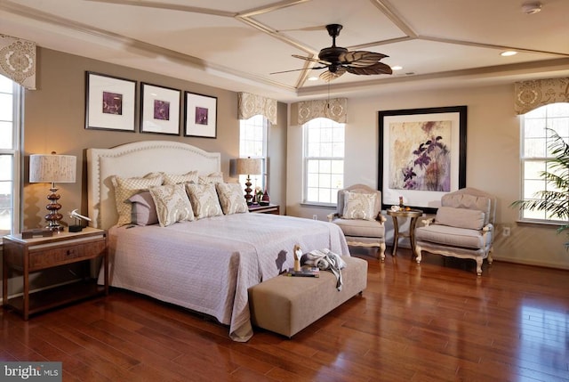 bedroom featuring dark hardwood / wood-style floors and ceiling fan