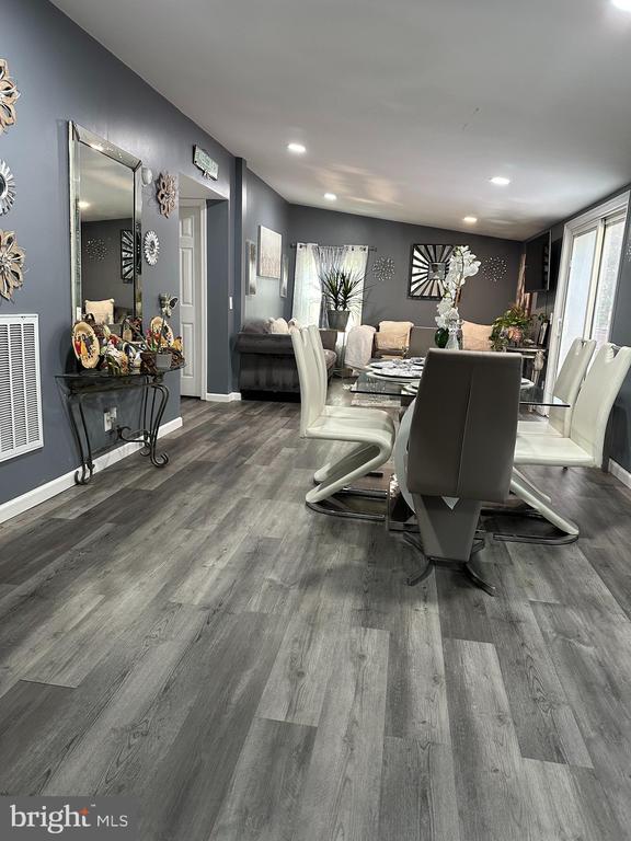 dining space featuring hardwood / wood-style flooring