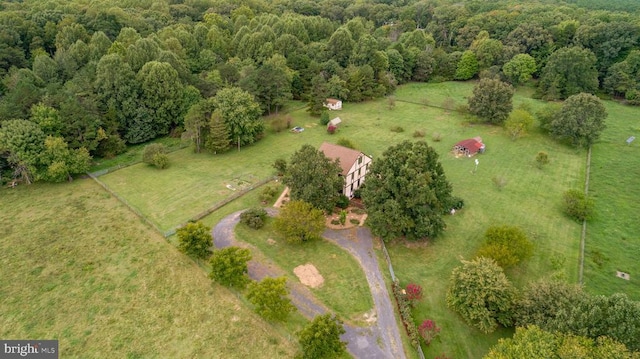 birds eye view of property with a rural view