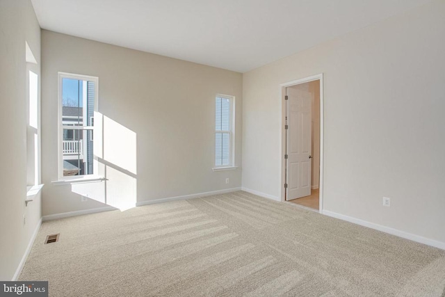 view of carpeted spare room