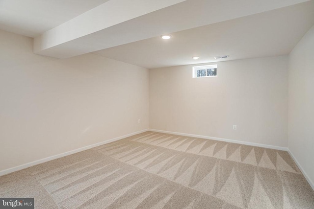 basement featuring carpet floors