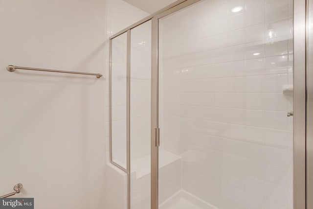 bathroom featuring an enclosed shower