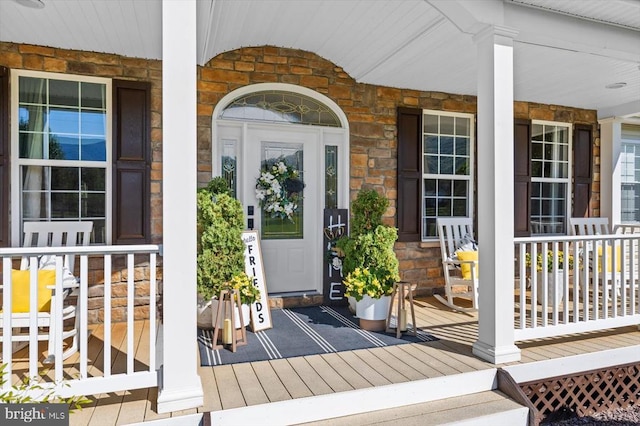 property entrance with a porch