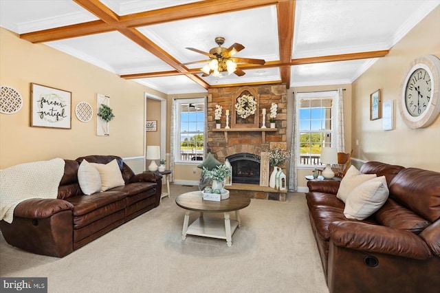 living room with a fireplace, crown molding, coffered ceiling, carpet floors, and ceiling fan