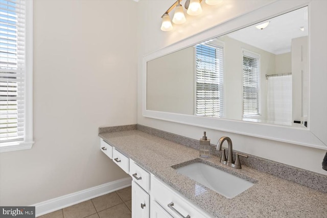 bathroom with vanity and tile patterned flooring