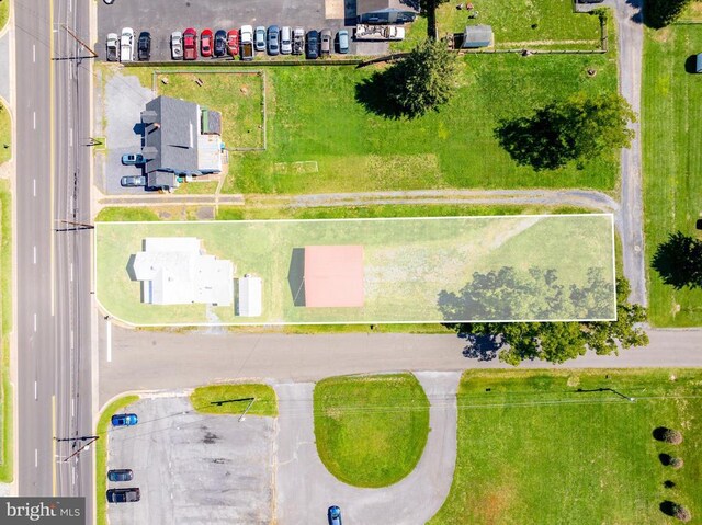 drone / aerial view featuring a mountain view