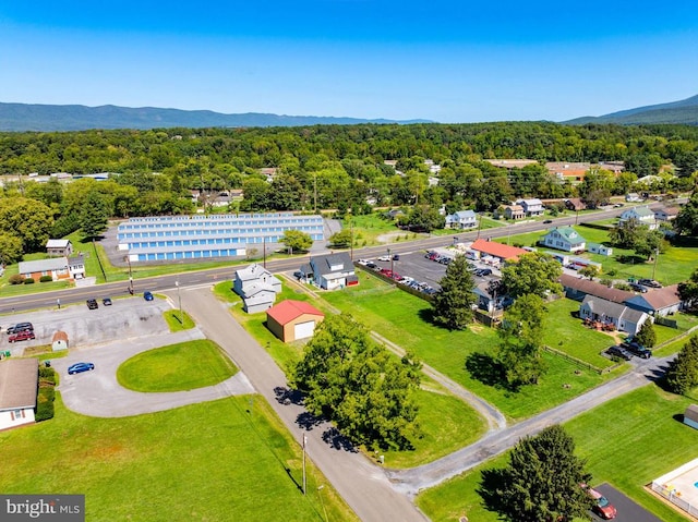 drone / aerial view featuring a mountain view