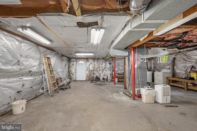 basement with separate washer and dryer