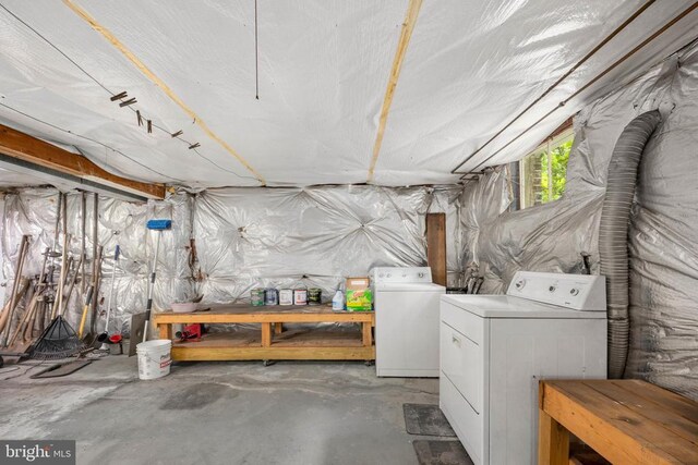 basement featuring washing machine and clothes dryer