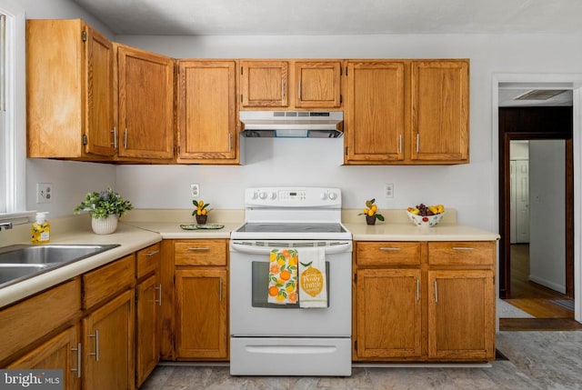 kitchen with white range with electric cooktop