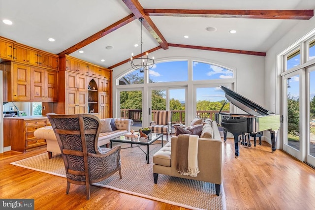 living room with light wood-type flooring and a wealth of natural light