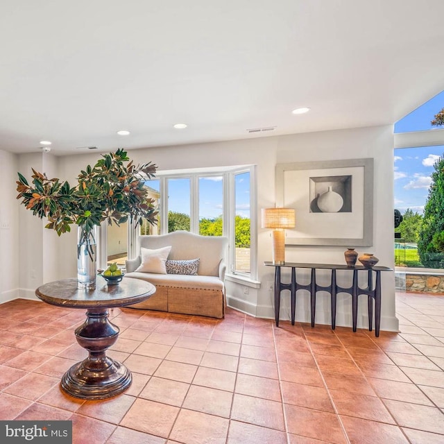 living room featuring light tile patterned flooring