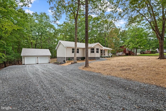 view of front of home with an outbuilding and a garage