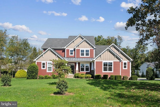 craftsman house with a front lawn