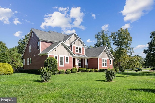 view of front of home with a front lawn