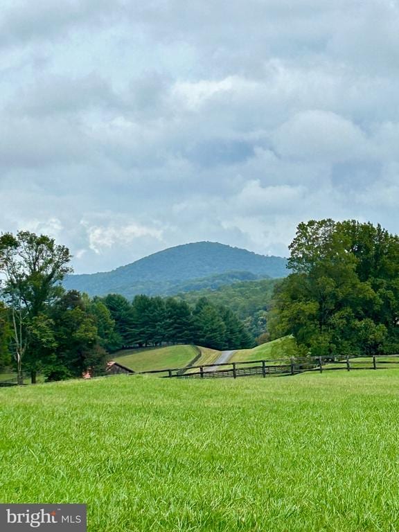 property view of mountains featuring a rural view