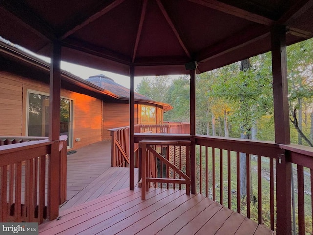 wooden deck with a gazebo