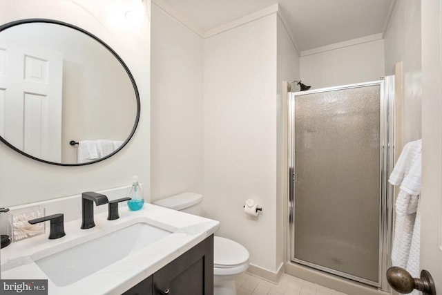 bathroom with vanity, ornamental molding, tile patterned floors, toilet, and a shower with door