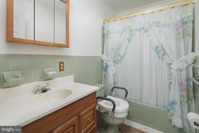 full bathroom featuring vanity, shower / bathtub combination with curtain, tile patterned flooring, ornamental molding, and toilet