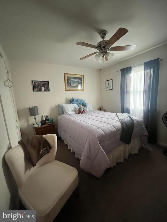 bedroom featuring ceiling fan