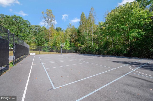 view of tennis court with basketball court