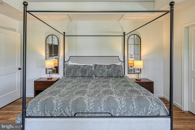 bedroom with wood-type flooring