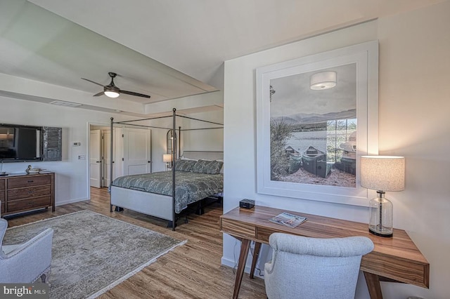 bedroom featuring ceiling fan and hardwood / wood-style floors