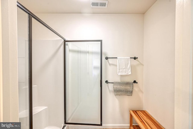 bathroom with an enclosed shower