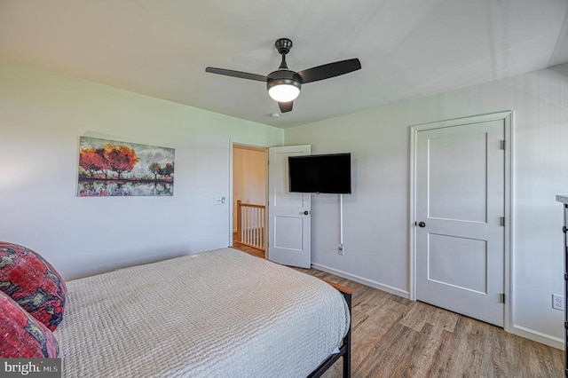 bedroom featuring ceiling fan and light hardwood / wood-style floors