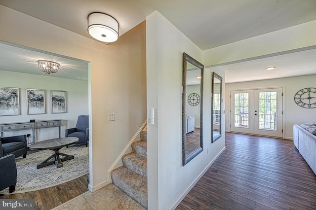 interior space with hardwood / wood-style floors and french doors