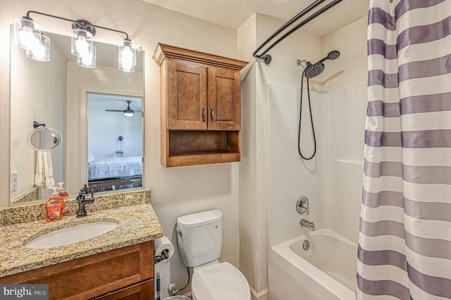 full bathroom featuring ceiling fan, vanity, toilet, and shower / bathtub combination with curtain