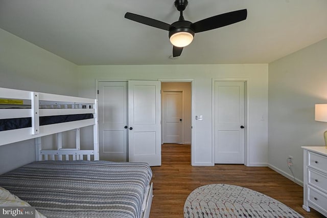 bedroom featuring ceiling fan and dark hardwood / wood-style flooring