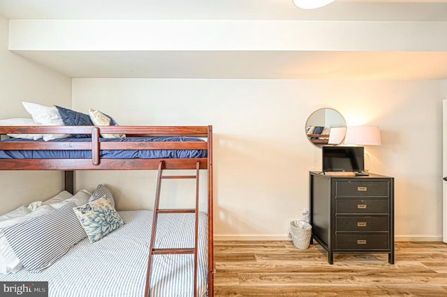 bedroom with light hardwood / wood-style floors