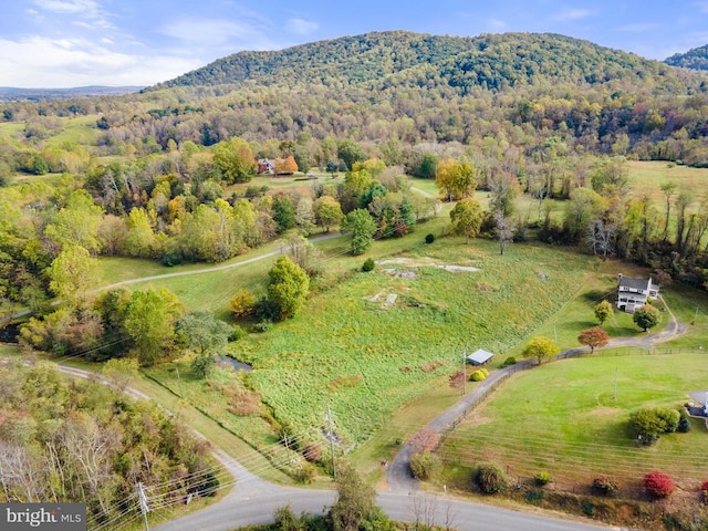 aerial view featuring a rural view and a mountain view