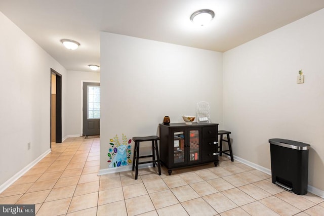 interior space featuring light tile patterned flooring