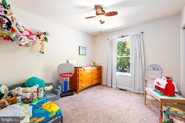 recreation room featuring carpet floors and ceiling fan