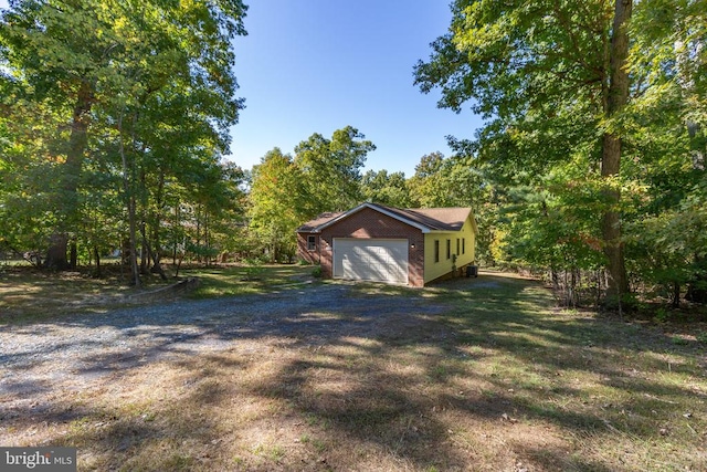 view of yard with a garage