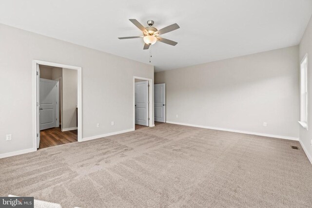 371 Glenmore Ln, Keswick, VA 22947 - unfurnished bedroom with carpet, baseboards, and a ceiling fan