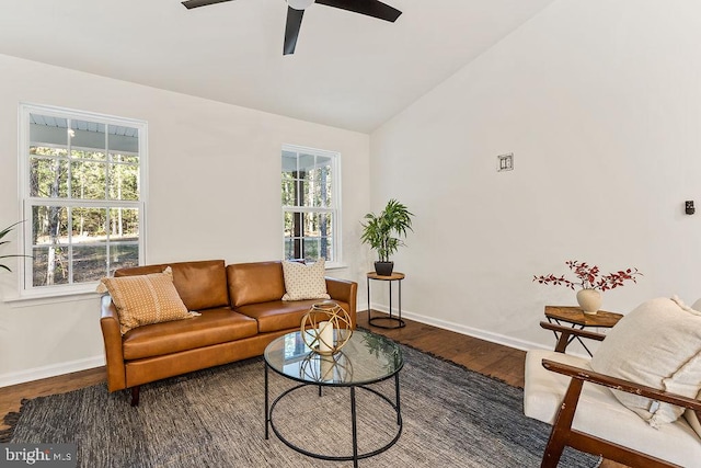 living room with lofted ceiling, hardwood / wood-style floors, a healthy amount of sunlight, and ceiling fan