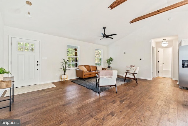 living room featuring vaulted ceiling with beams, wood-type flooring, and ceiling fan